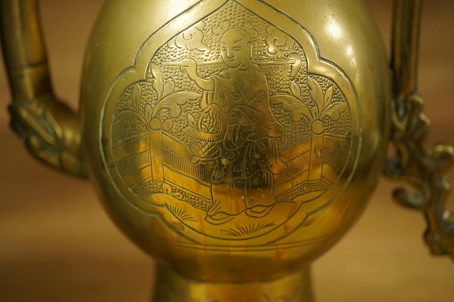 A Chinese cylindrical blue and white brush pot and a brass ewer, largest 39cm high. Condition - fair